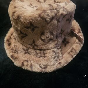 Chic Tan And Black Monogram Fur Bucket Hat